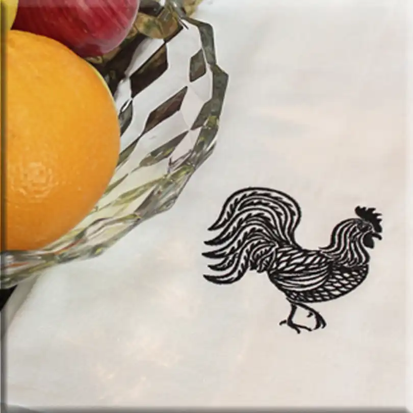 Towel with rooster embroidered on it